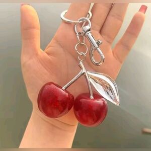 Nwot Cherry Bag charm With Silver Tone Hardware